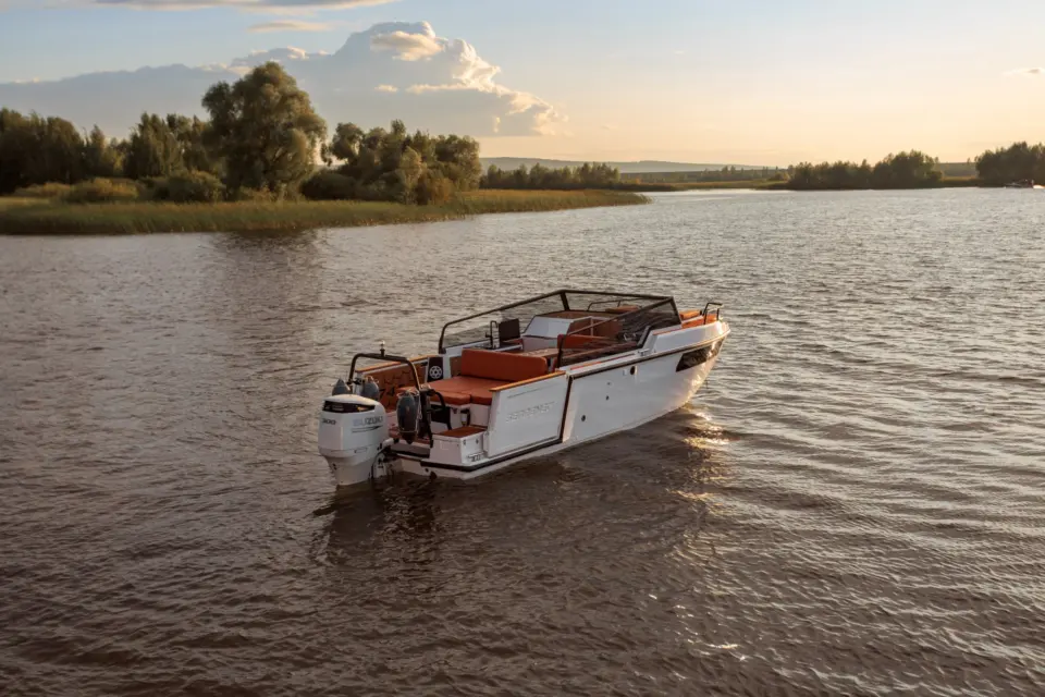 SEARENE 815 OPEN boat on the river in the evening — rear view