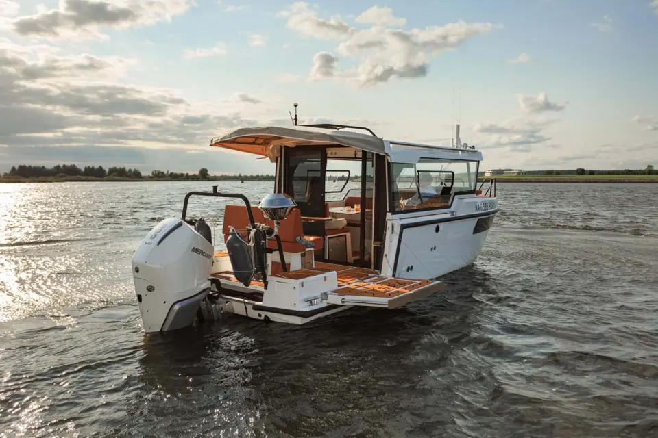 Rear quarter view of the SEARENE 815 Crew Cabin yacht at sunset