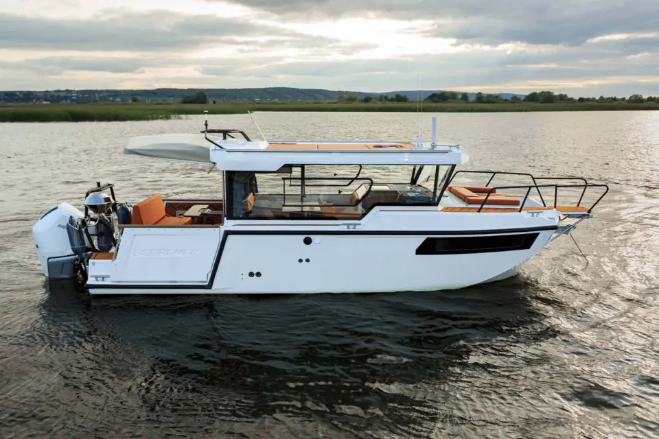 Side view of the SEARENE 815 Crew Cabin yacht at sunset